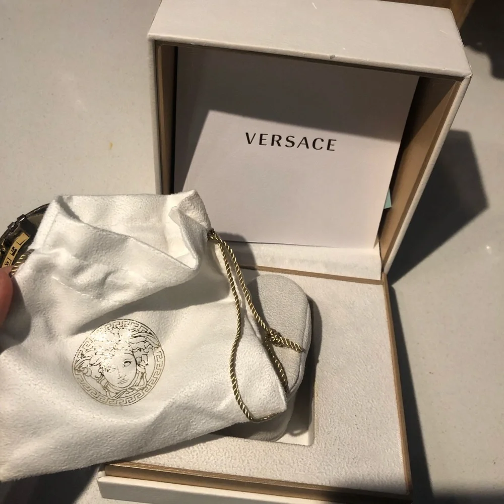 Versace White Dial Watch with Gold Bezel and Brown Strap